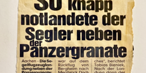 So schafft man es in die "Bildzeitung": Artikel über die "Notlandung" von LVA-Fluglehrer Tobias Bieneck gleich neben einer Granate aus dem Zweiten Weltkrieg. (Quelle: Bildzeitung vom Mai 2011, genaues Datum unbekannt)